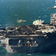 Illustration for article titled Natural Tilt-Shift Effect Turns the Biggest Warship in the World Into a Tiny Model